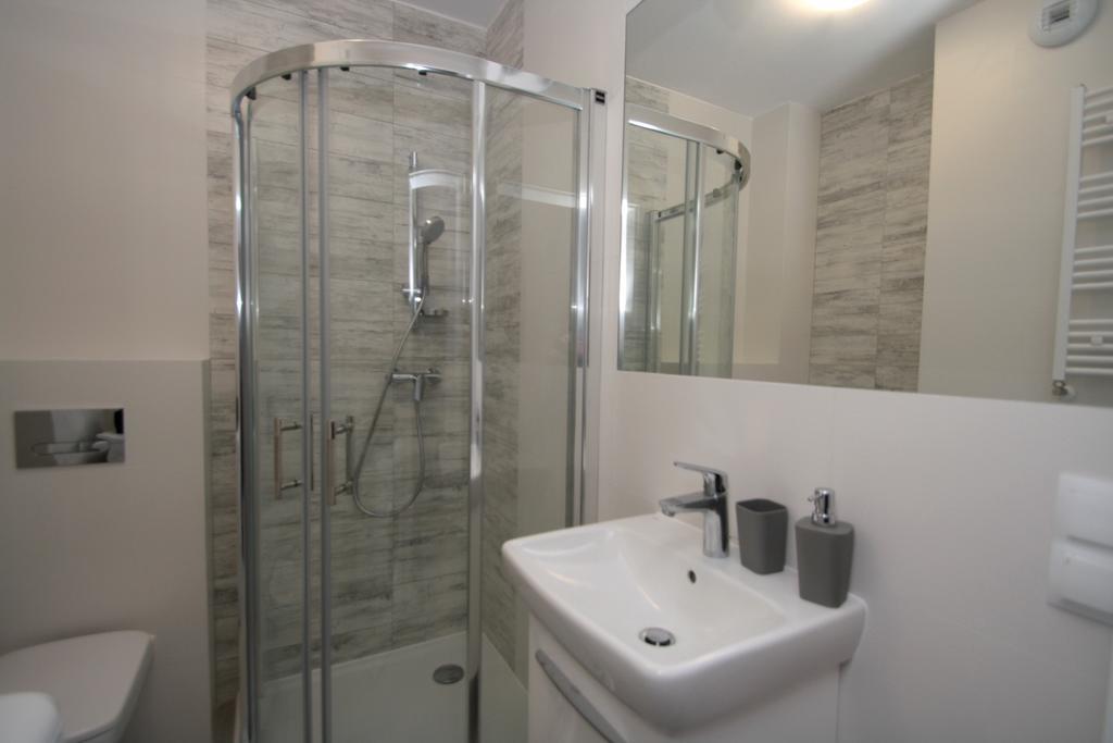100-Sio Apartamenty คอซซาลิน ภายนอก รูปภาพ