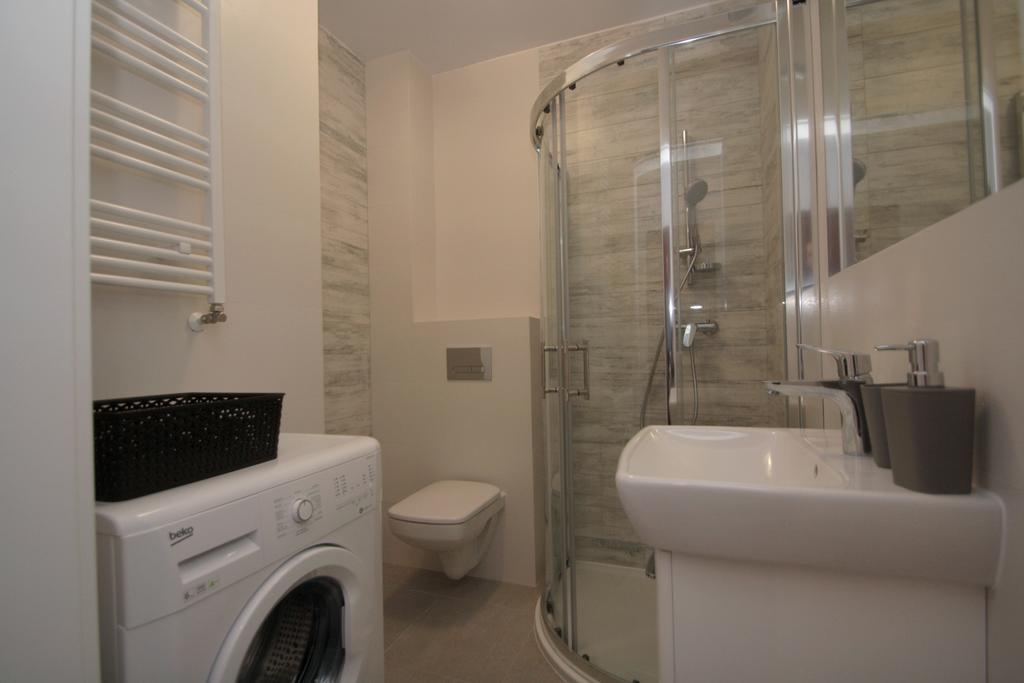 100-Sio Apartamenty คอซซาลิน ภายนอก รูปภาพ